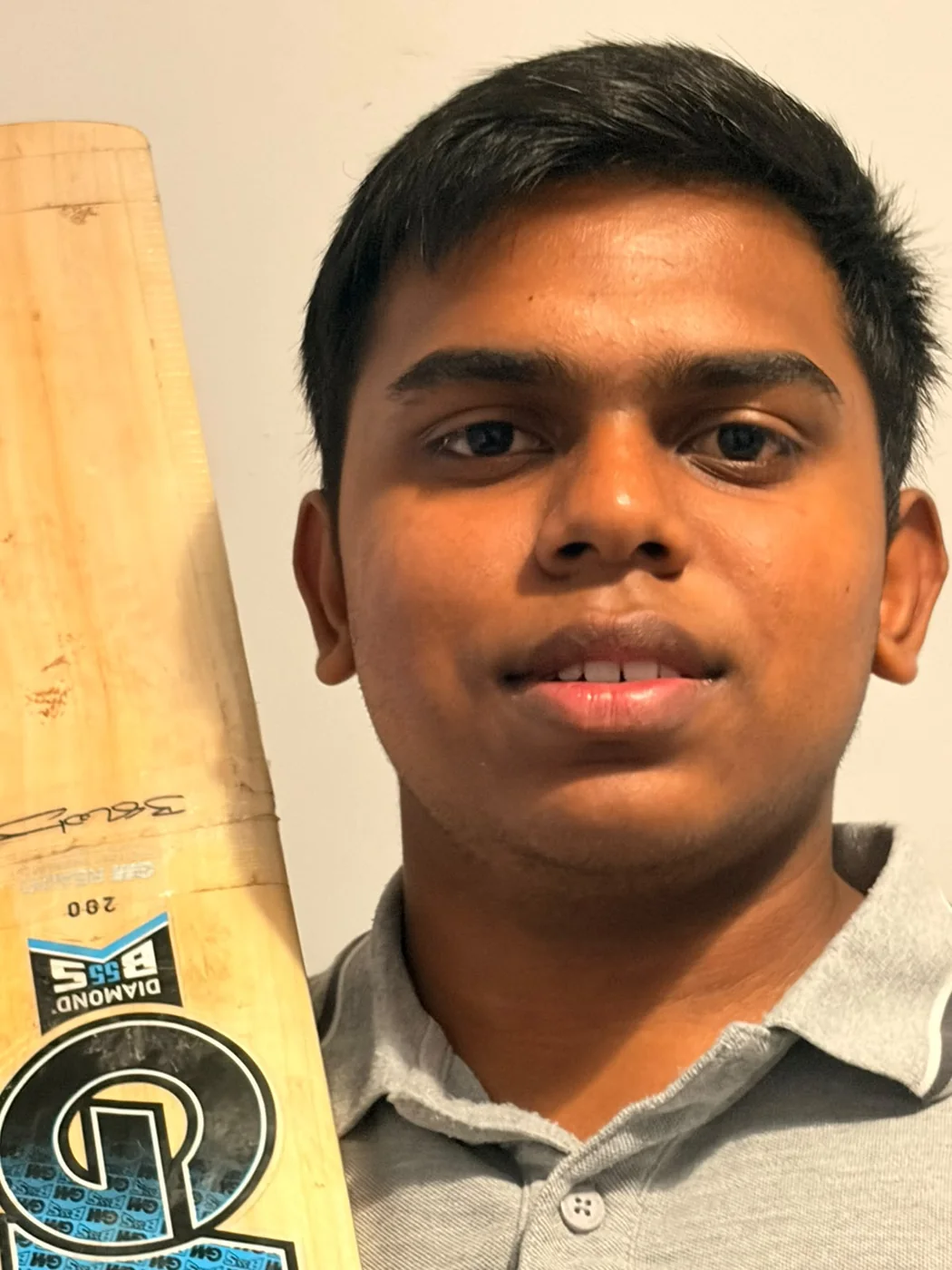 Steve holding a cricket bat